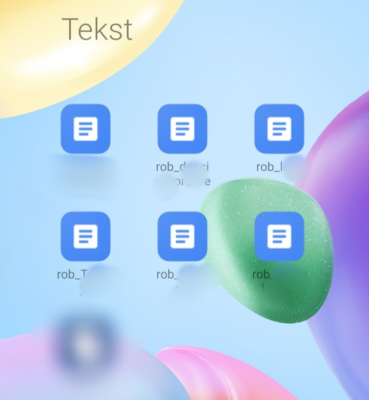 Zawartość folder "Tekst" na ekranie głównym smartfona, gdzie znajdują się pliki z tekstami piosenek tekściarza